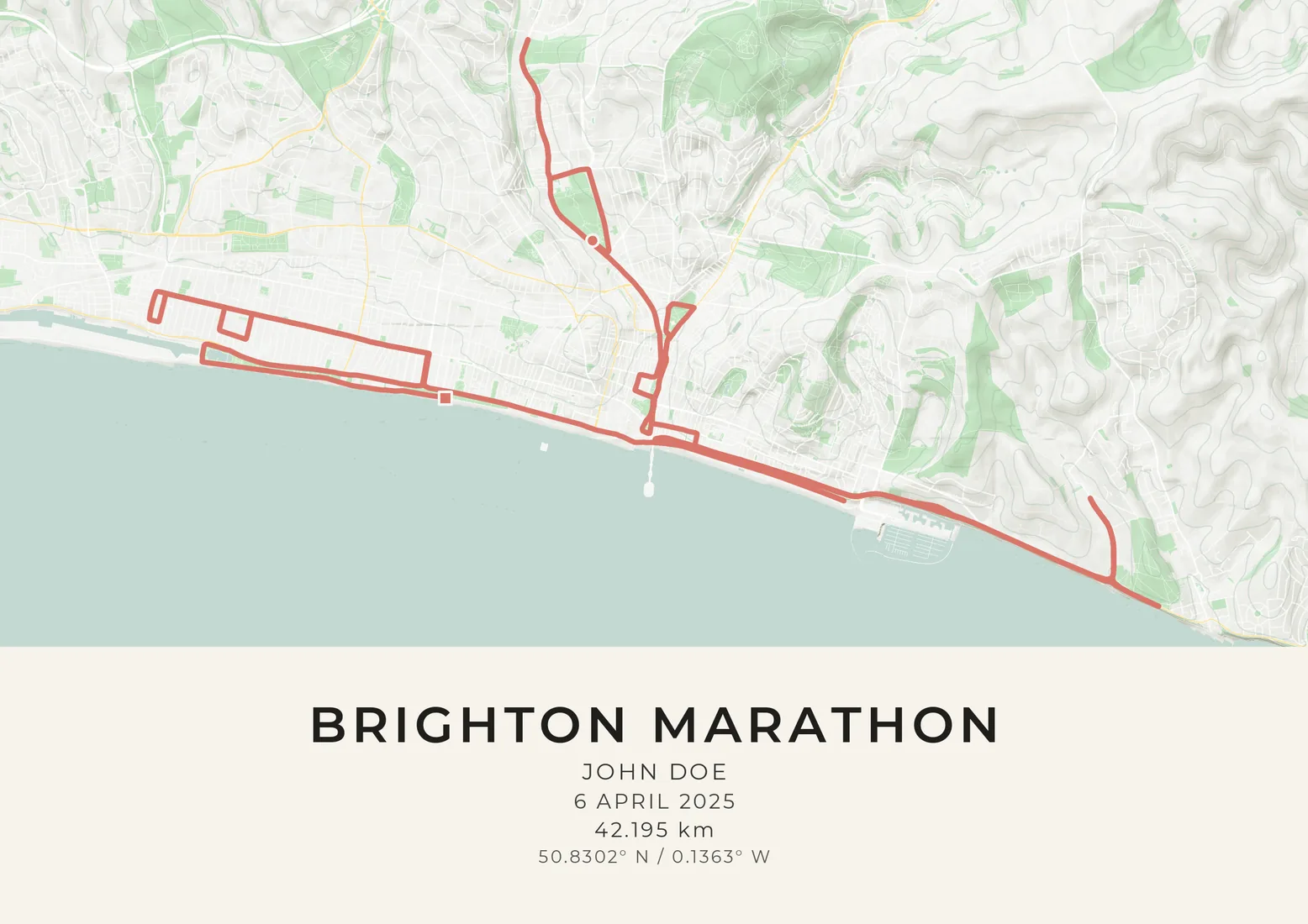 A landscape map artwork of the Brighton Marathon course: the route drawn as a coral line from Preston Park down through the city, out along the seafront towards Rottingdean and back to the finish on the Hove seafront, on pale sea glass with the green Downs shaded above the town and the sea filling the lower half, and a sample name, the race day and the distance printed beneath.